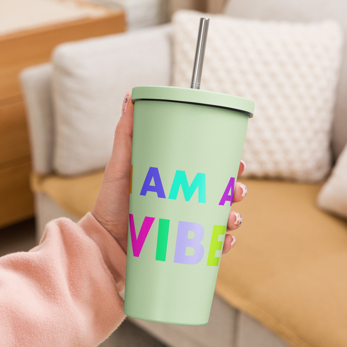Insulated tumbler with a straw