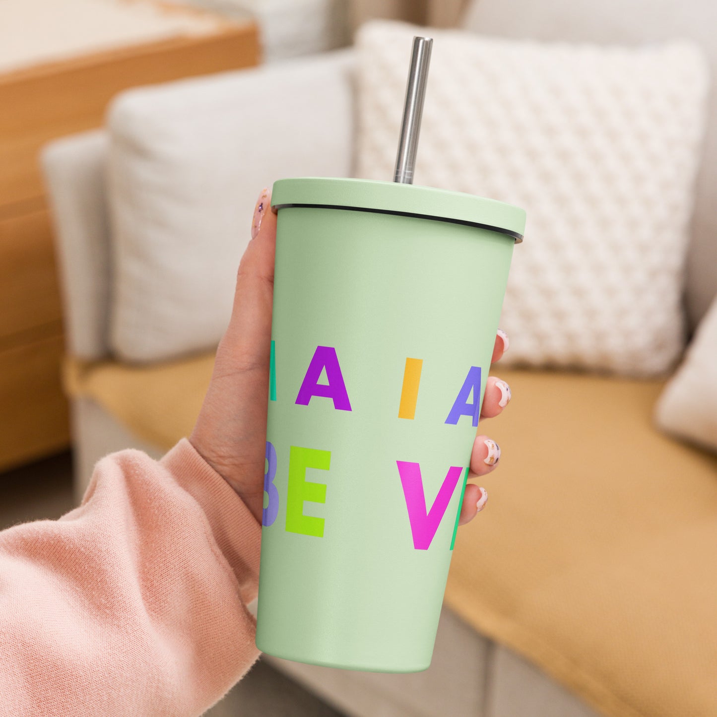 Insulated tumbler with a straw